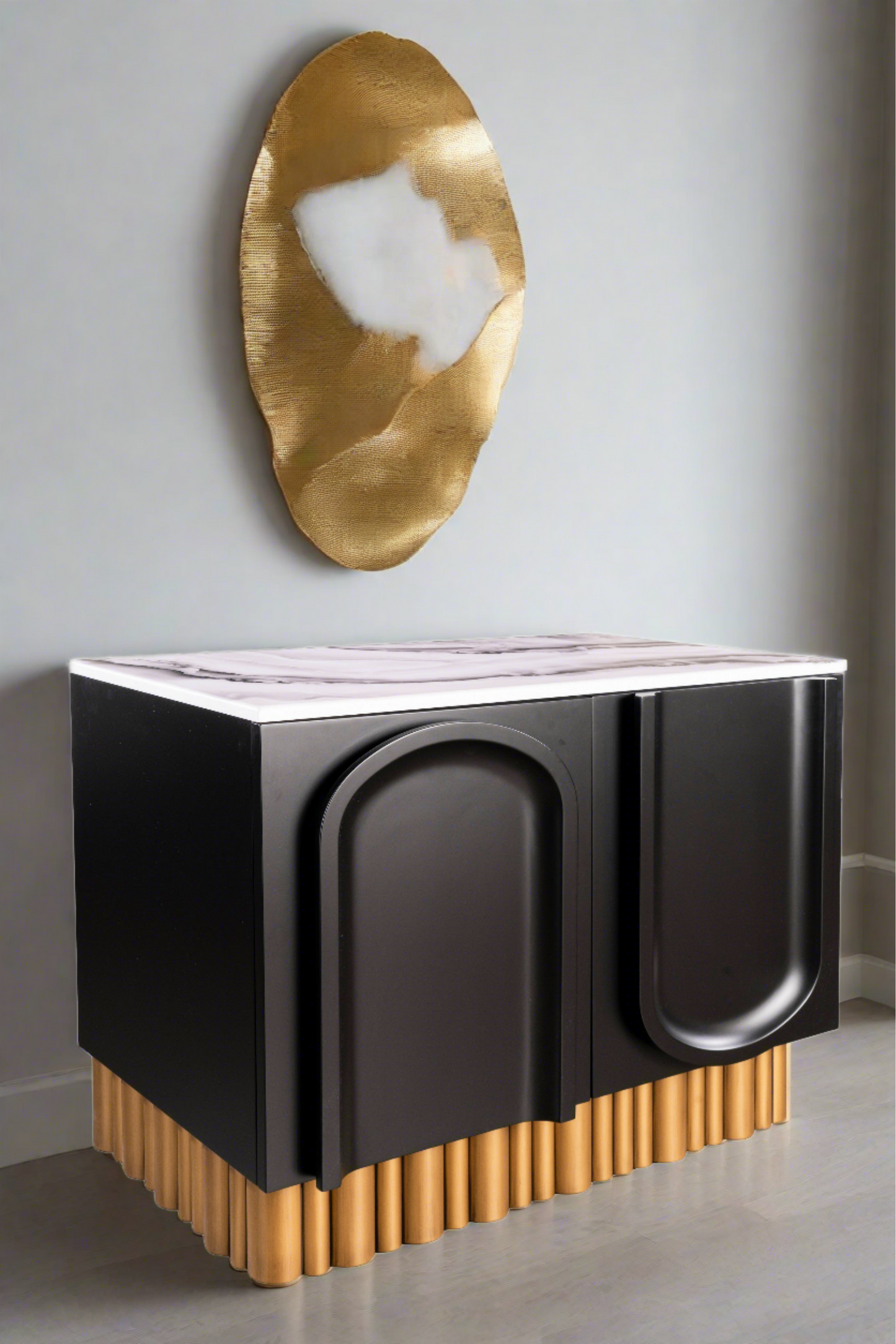 sculptural black and white accent chest with gold base