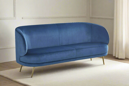 Blue velvet sofa with gold legs