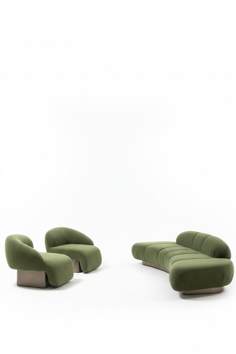 Modern green sofa set with matching accent chairs