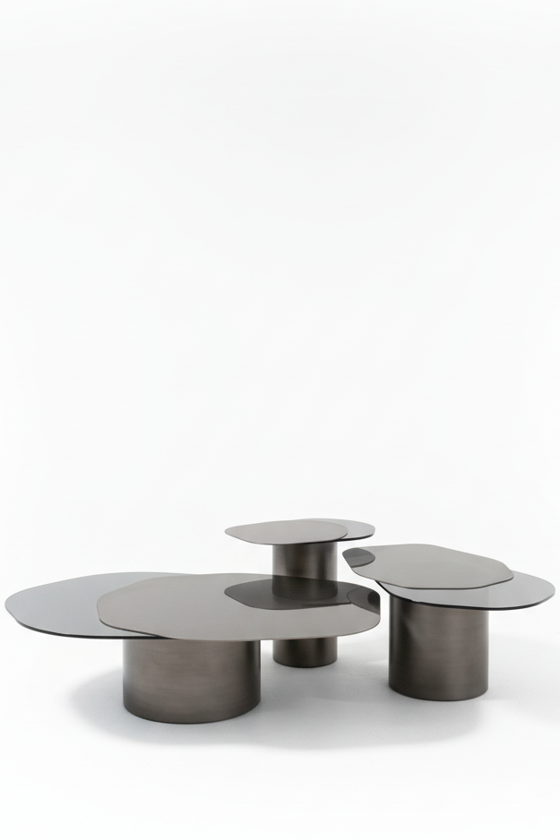 Set of three metallic coffee tables in matte silver