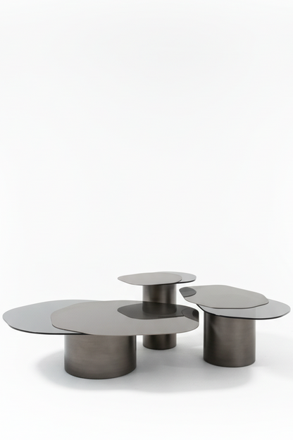 Set of three metallic coffee tables in matte silver
