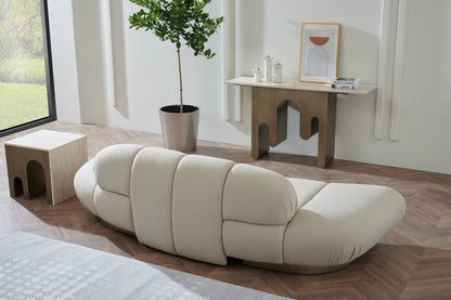 white modern curved sofa that looks great from the back