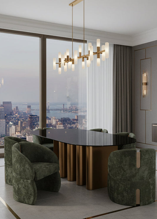 luxury dining set with a brass table and green chairs 